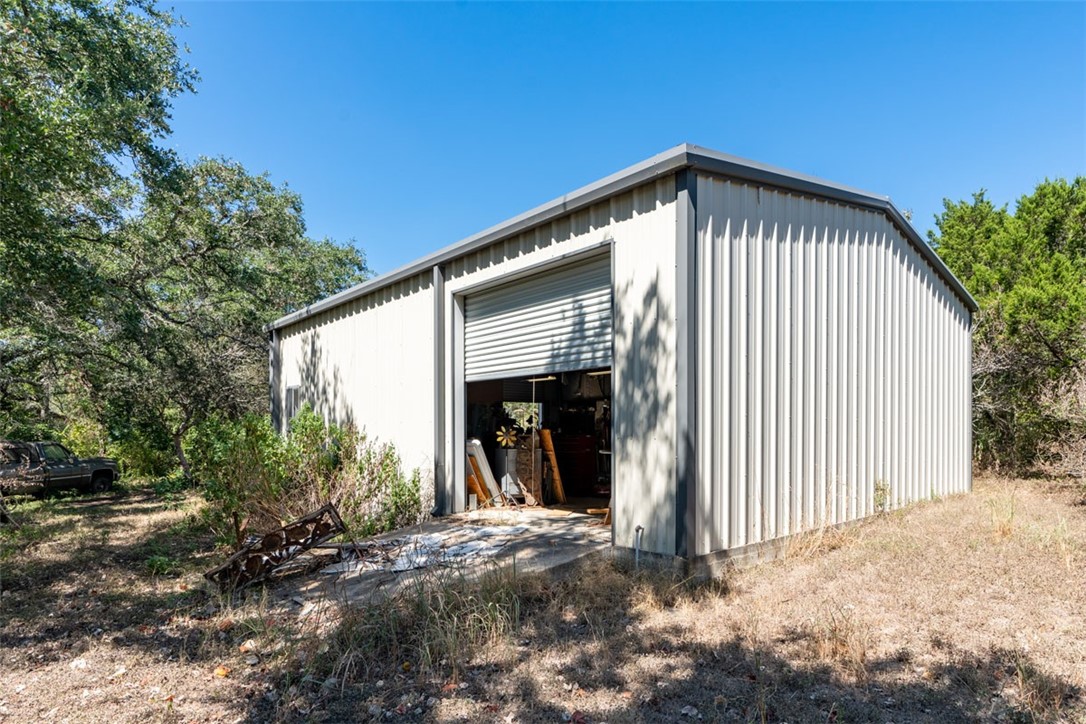 8701 Highway 290 Austin, TX 78737 - Photo 10 of 40 a view of a house with a backyard
