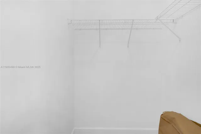 a view of hallway with washer and dryer