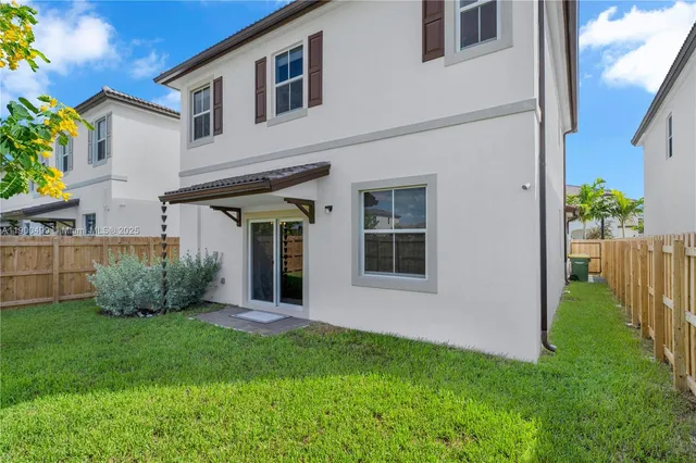 a view of swimming pool with outdoor seating
