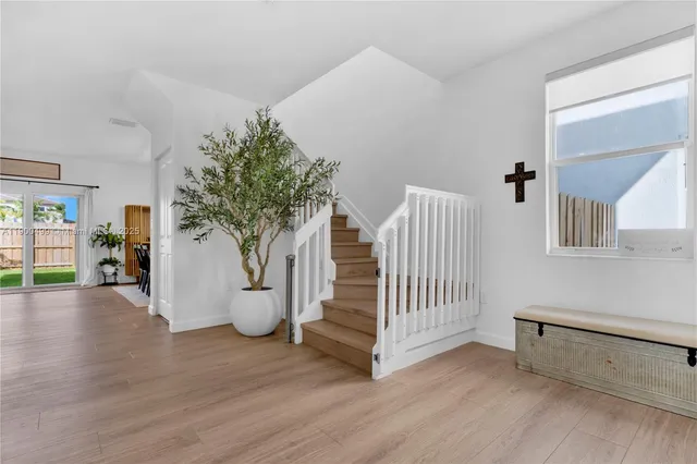 a view of entryway with livingroom