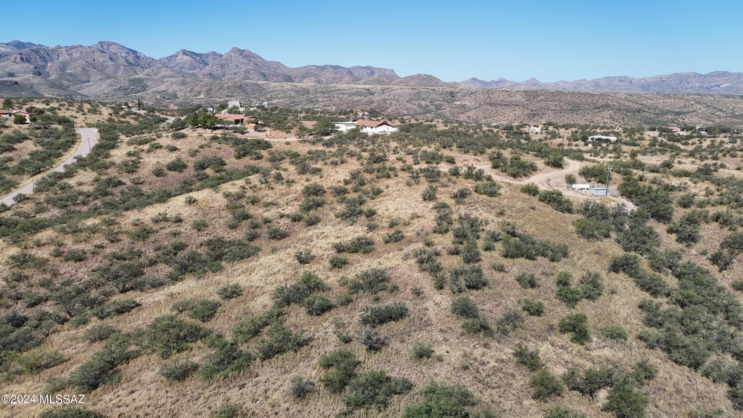 600 Paseo Reforma, Unit 71 Rio Rico, AZ 85648 - Photo 6 of 13 an aerial view of residential house and green space