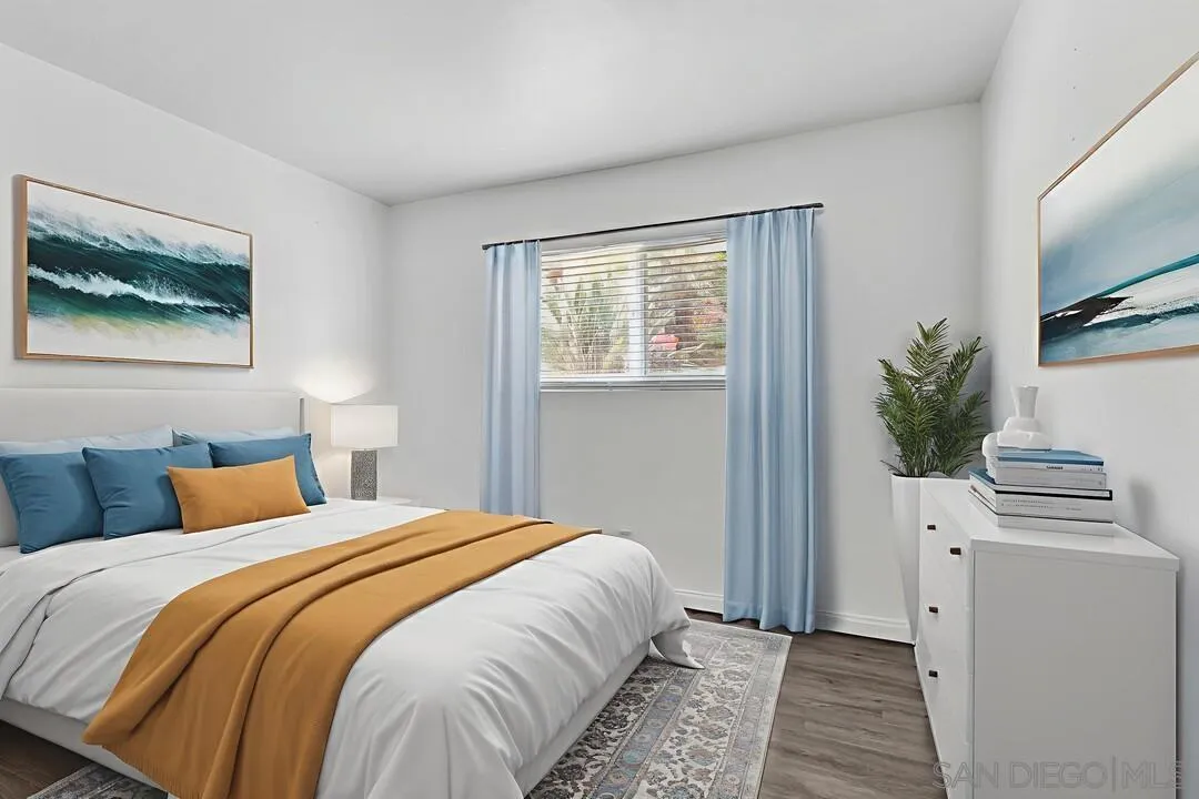 9860 Dale Avenue, Unit A12 Spring Valley, CA 91977 - Photo 17 of 28 a bedroom with bed and a window