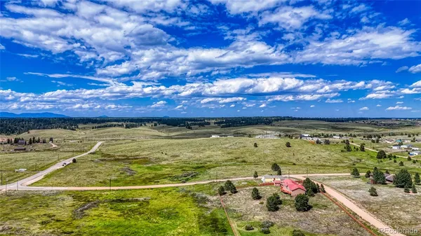 a view of a lake with a building in the background