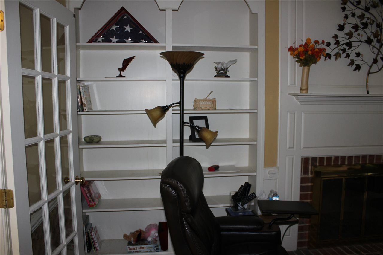 10509 New Arden Way Raleigh, NC 27613 - Photo 23 of 25 Built-In Bookcases in Family Room