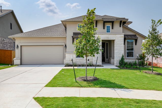 Beautifully designed modern style home with stucco and stone sidings