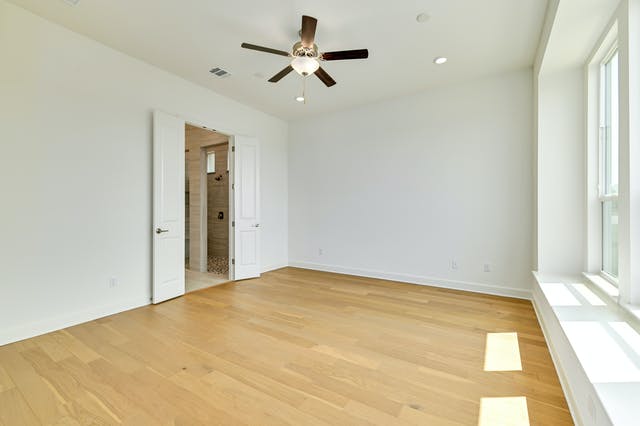 19005 Fernando Trail Austin, TX 78738 - Photo 10 of 26 Empty room with light wood finished floors, ceiling fan, and recessed lighting