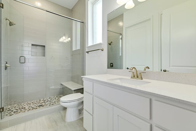 19005 Fernando Trail Austin, TX 78738 - Photo 15 of 26 Full and private guest bathroom downstairs with stall shower and vanity