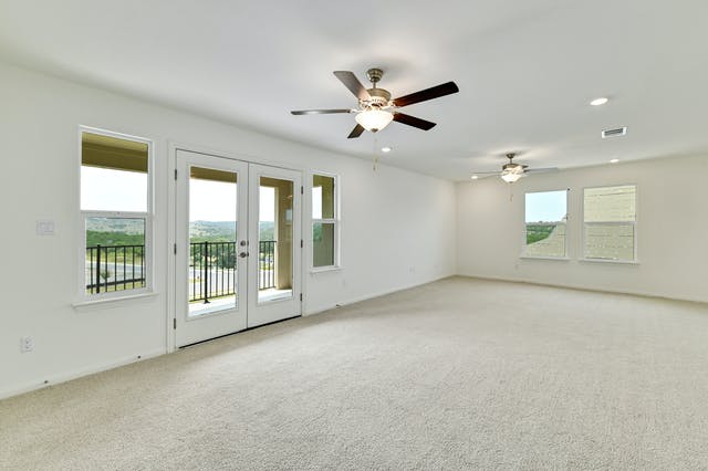 19005 Fernando Trail Austin, TX 78738 - Photo 18 of 26 Huge bedroom upstairs with private access to second floor covered patio can enjoy the unobstructed hill country view