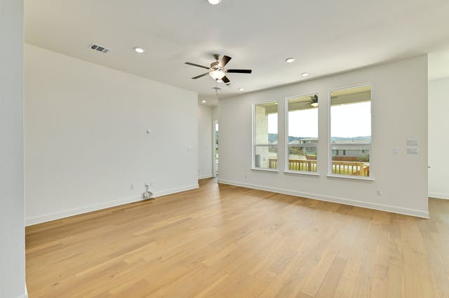 19005 Fernando Trail Austin, TX 78738 - Photo 3 of 26 Empty room with light wood-type flooring, a ceiling fan, and recessed lighting