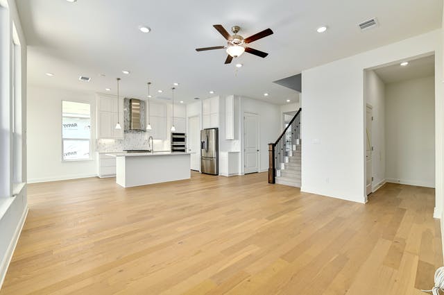 19005 Fernando Trail Austin, TX 78738 - Photo 8 of 26 Living room opens to kitchen