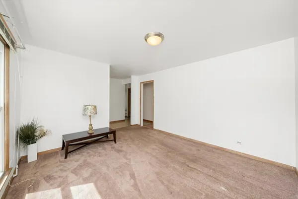 a view of a room with a bench