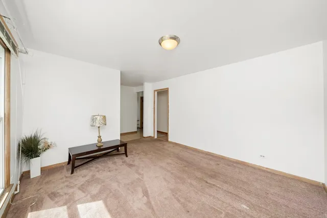 a view of a room with a bench