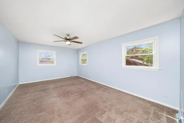 a view of a bedroom with a window