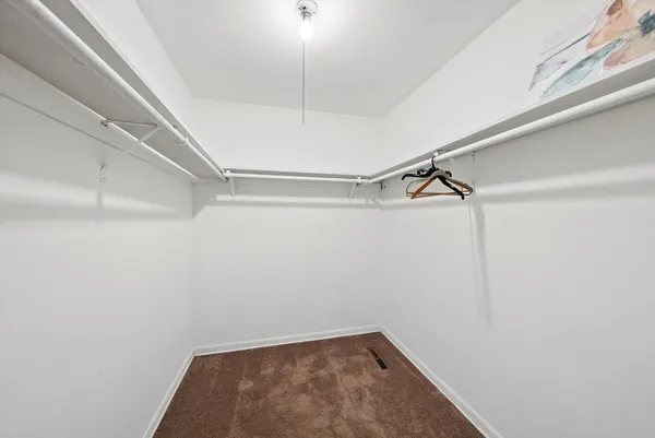 a view of a room with racks on the wall