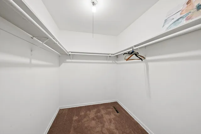 a view of a room with racks on the wall