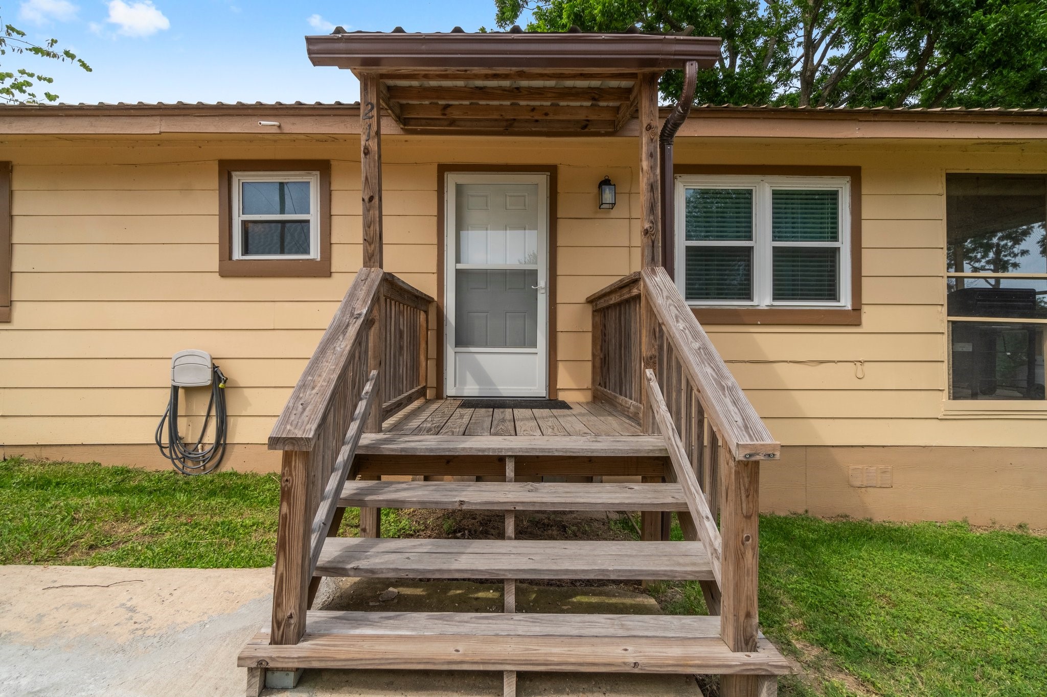 a view of a house with a large window