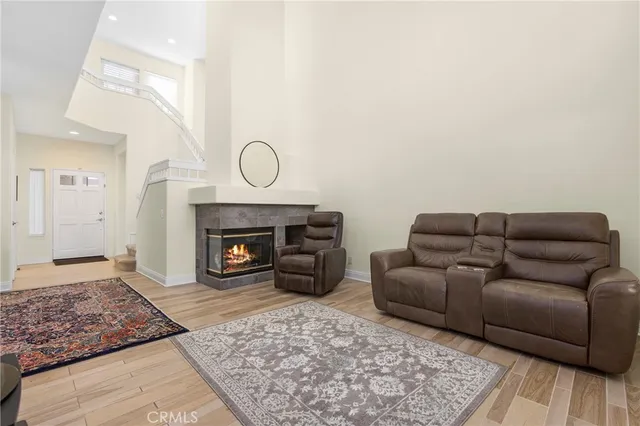 an aerial view of residential houses with outdoor space and swimming pool