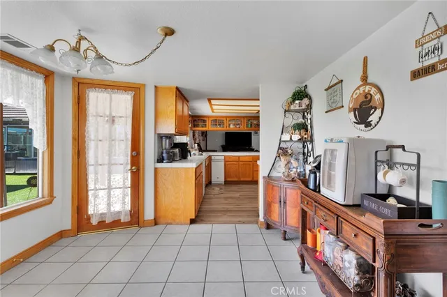a kitchen with stainless steel appliances granite countertop a stove and a sink
