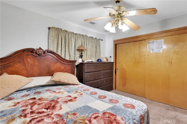 a bathroom with a sink double vanity and a mirror