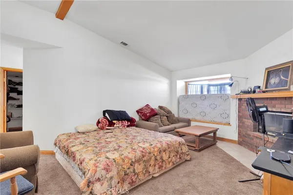 a spacious bathroom with stainless steel appliances granite countertop a sink a mirror and vanity