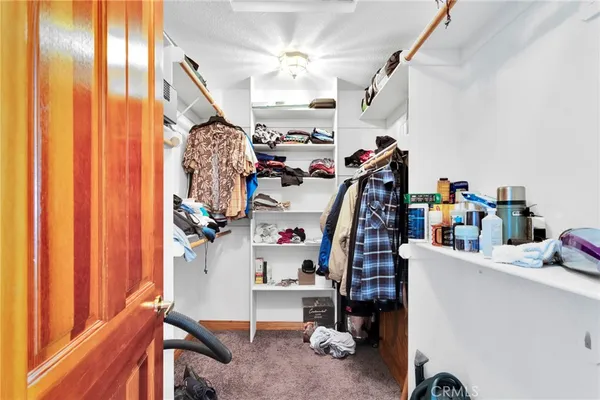 a view of a backyard with swimming pool