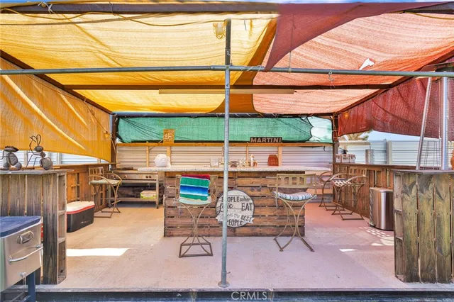 a view of a backyard of the house