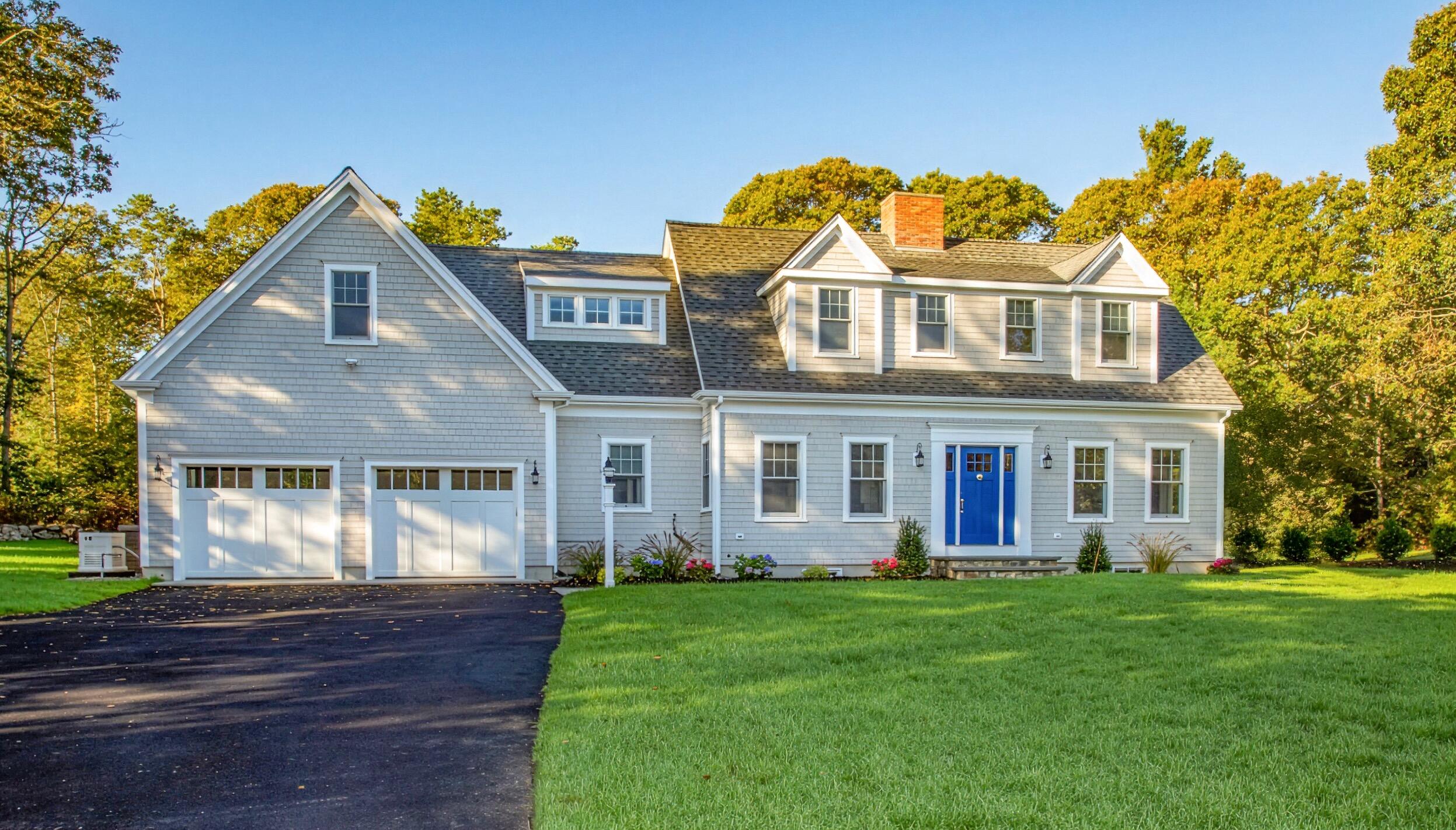 0 Ridgewood Drive Brewster, MA 02631 - Photo 12 of 39 a front view of a house with a yard