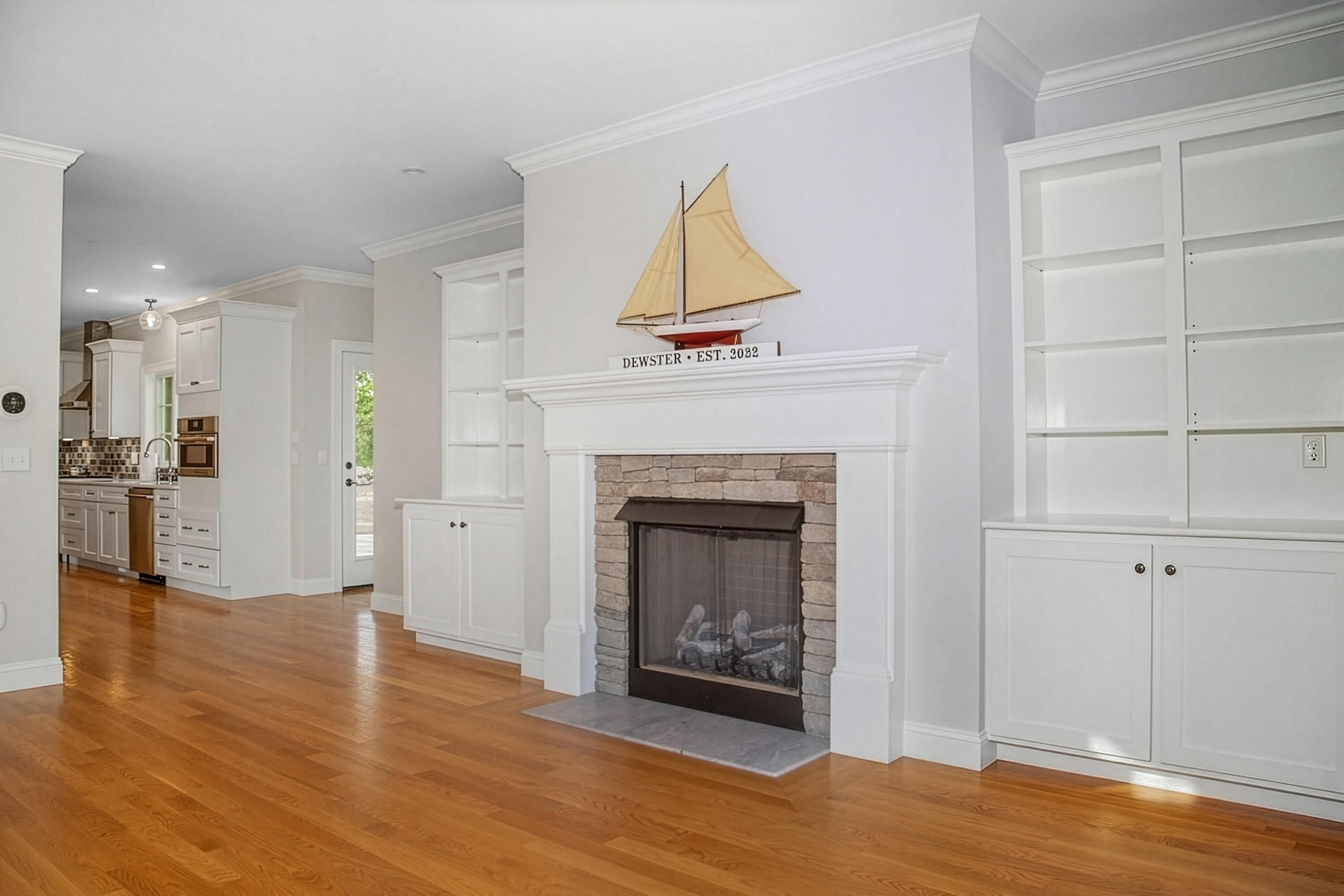 0 Ridgewood Drive Brewster, MA 02631 - Photo 13 of 39 a view of a livingroom with a fireplace and window