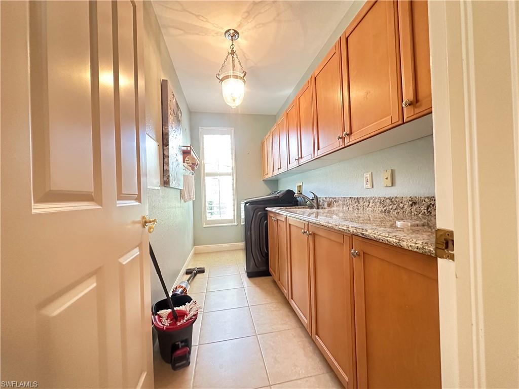 8411 Mallow Lane Naples, FL 34113 - Photo 22 of 31 a very nice looking room with a large window