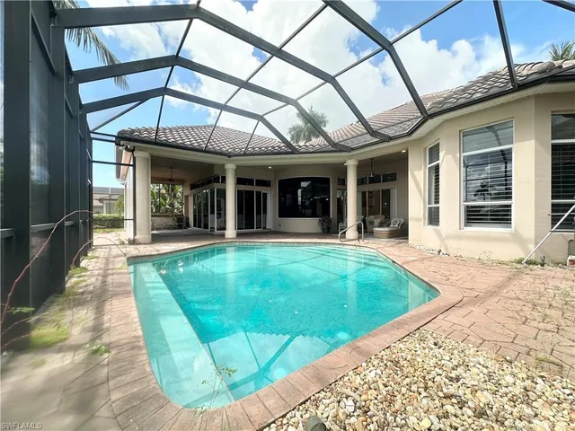 a view of a house with a swimming pool