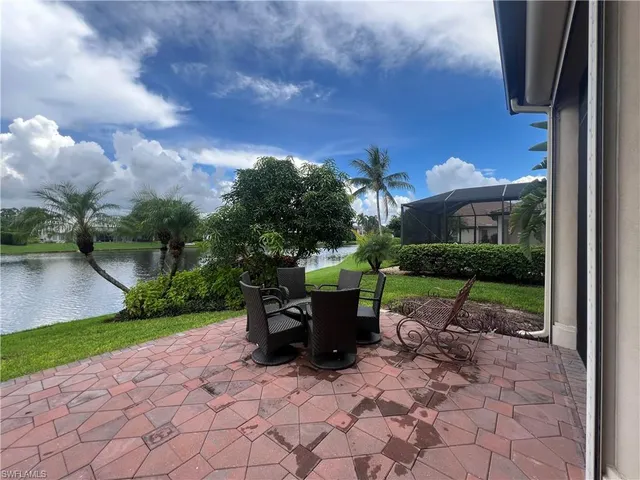 a view of a lake with a building in the background