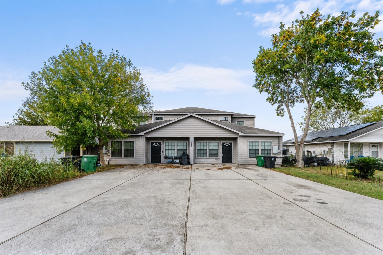 9610 Buffum Street, Unit B Houston, TX 77051 - Photo 2 of 25 a front view of a house with a yard