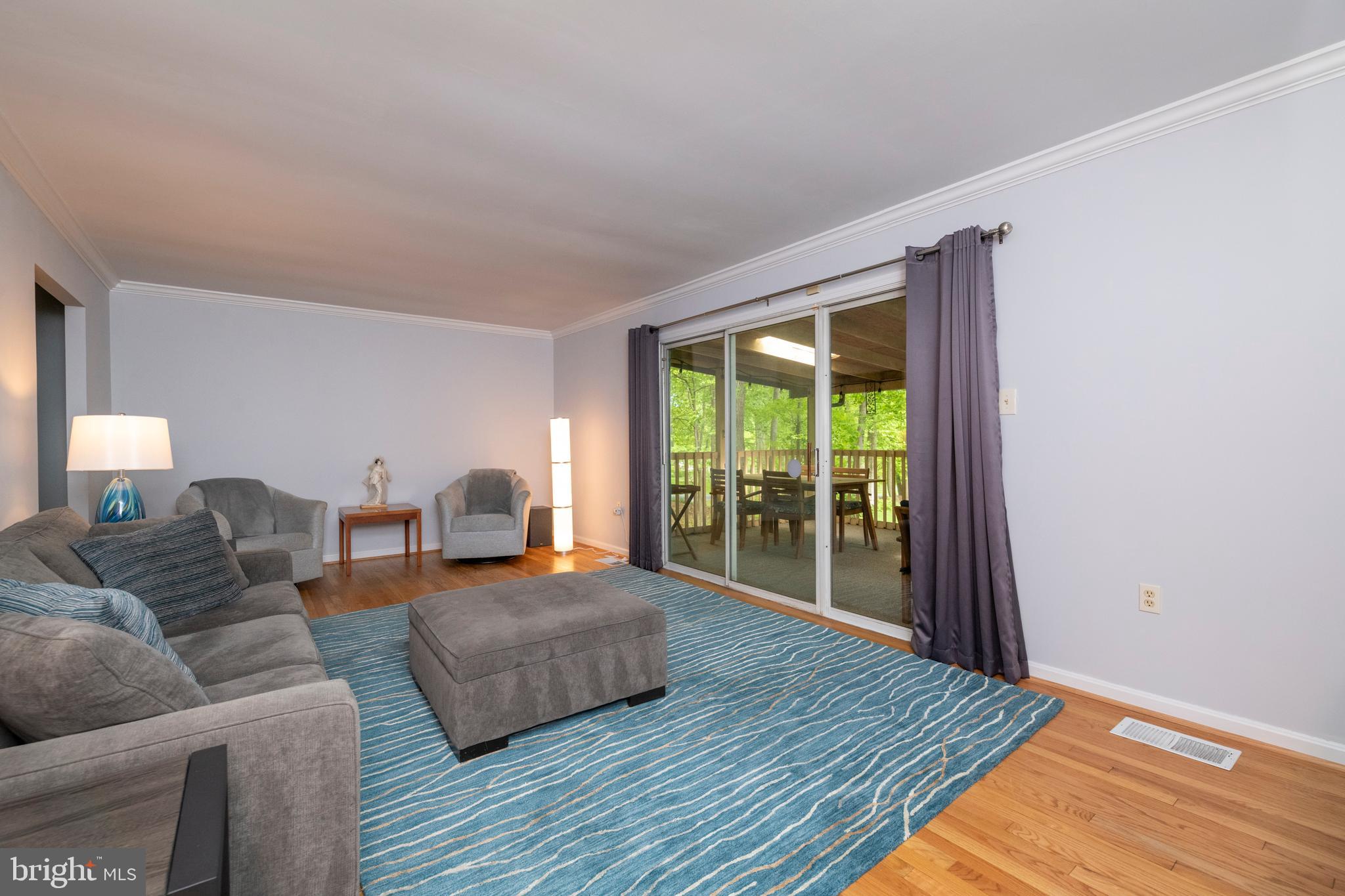 12262 Etchison Road Ellicott City, MD 21042 - Photo 15 of 47 Living Room has sliders to screened porch/Deck