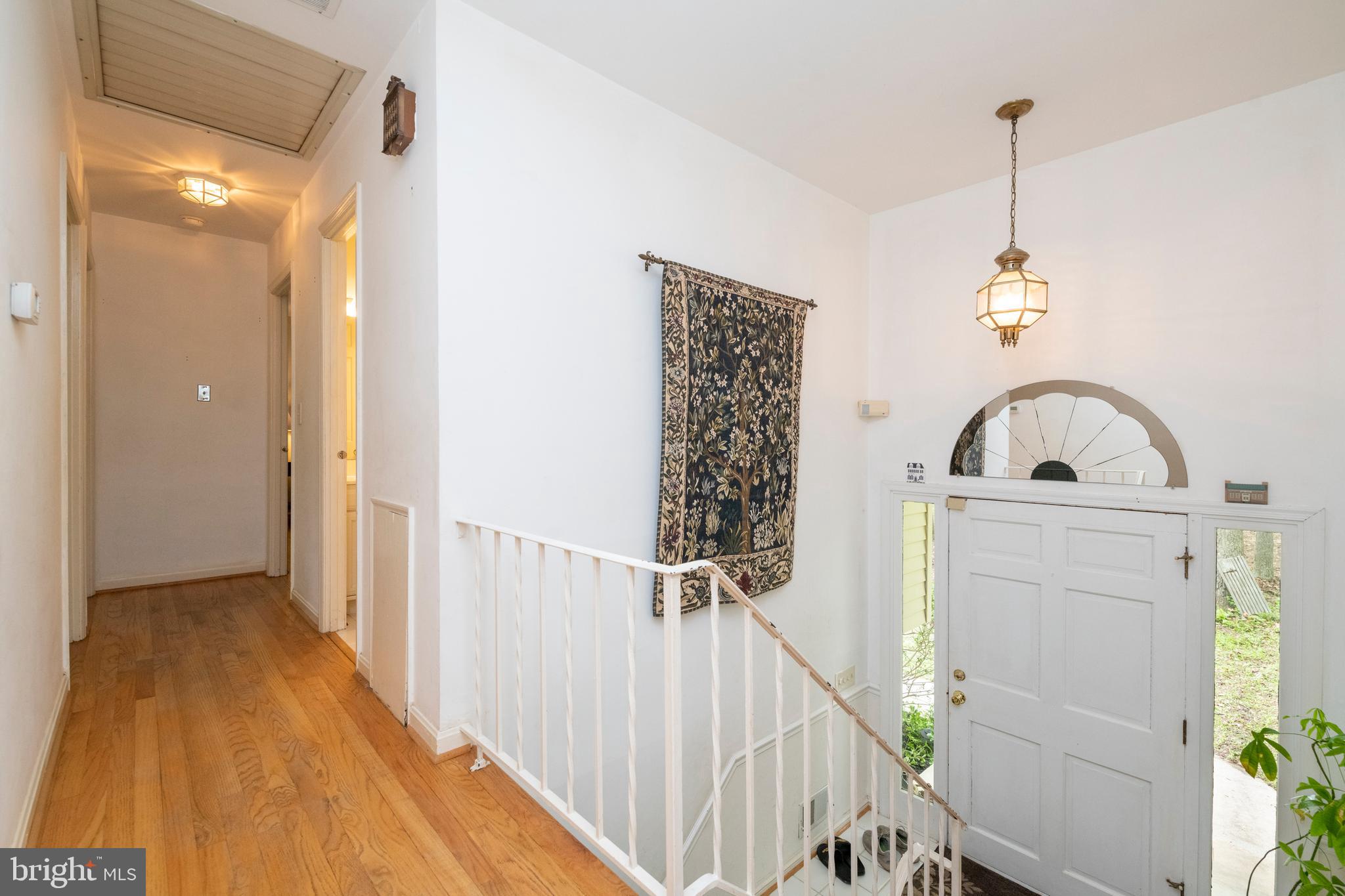 12262 Etchison Road Ellicott City, MD 21042 - Photo 19 of 47 Upper Hallway and Foyer Entrance