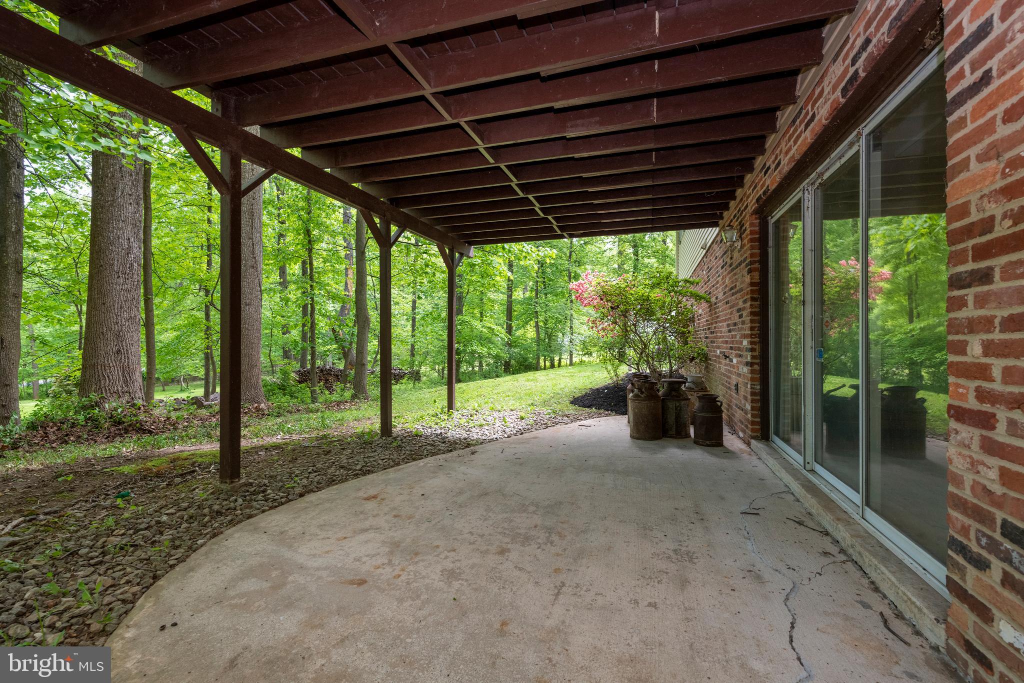 12262 Etchison Road Ellicott City, MD 21042 - Photo 43 of 47 Patio under covered Deck