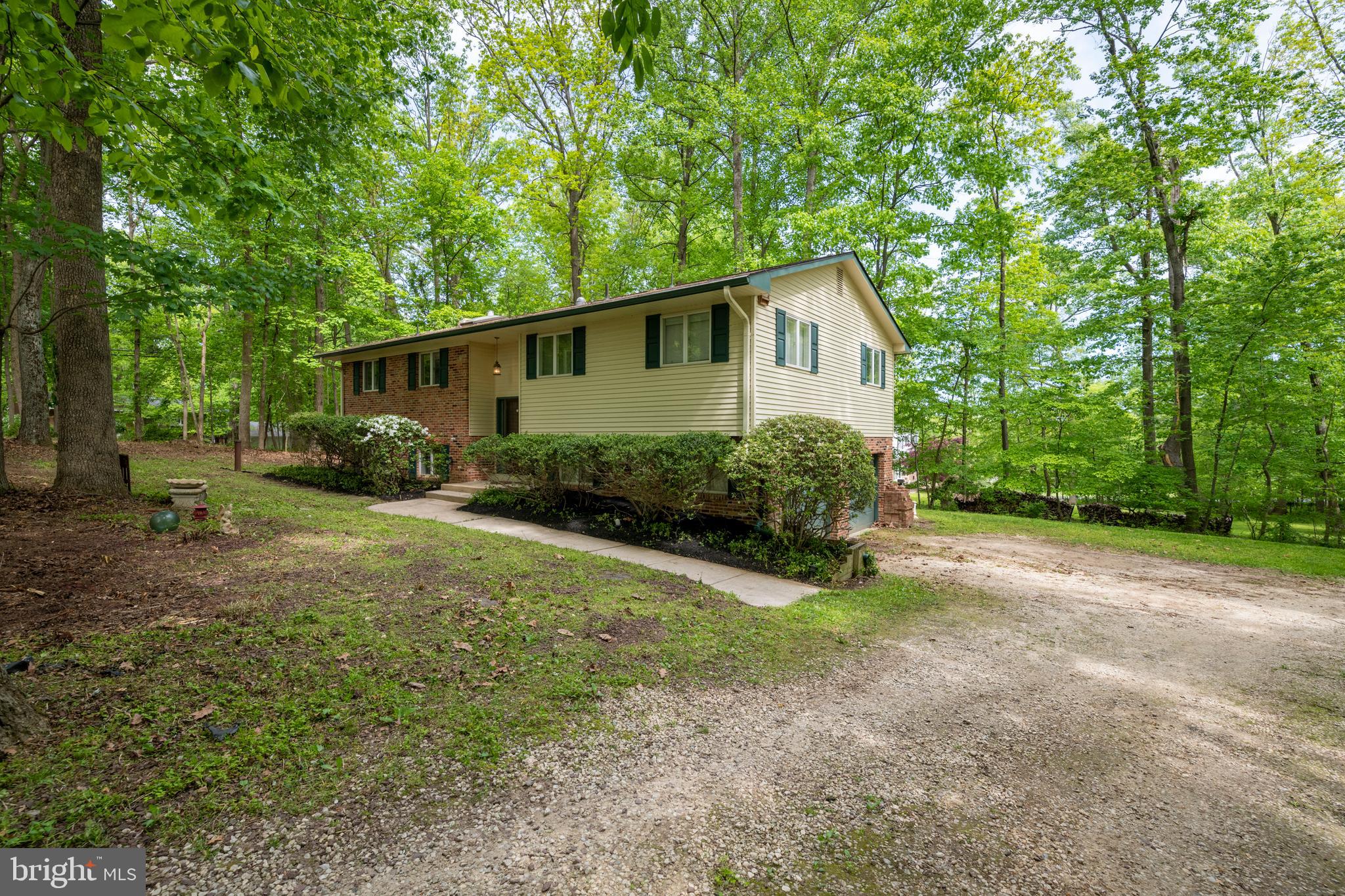12262 Etchison Road Ellicott City, MD 21042 - Photo 45 of 47 Large driveway leads to two car Garage