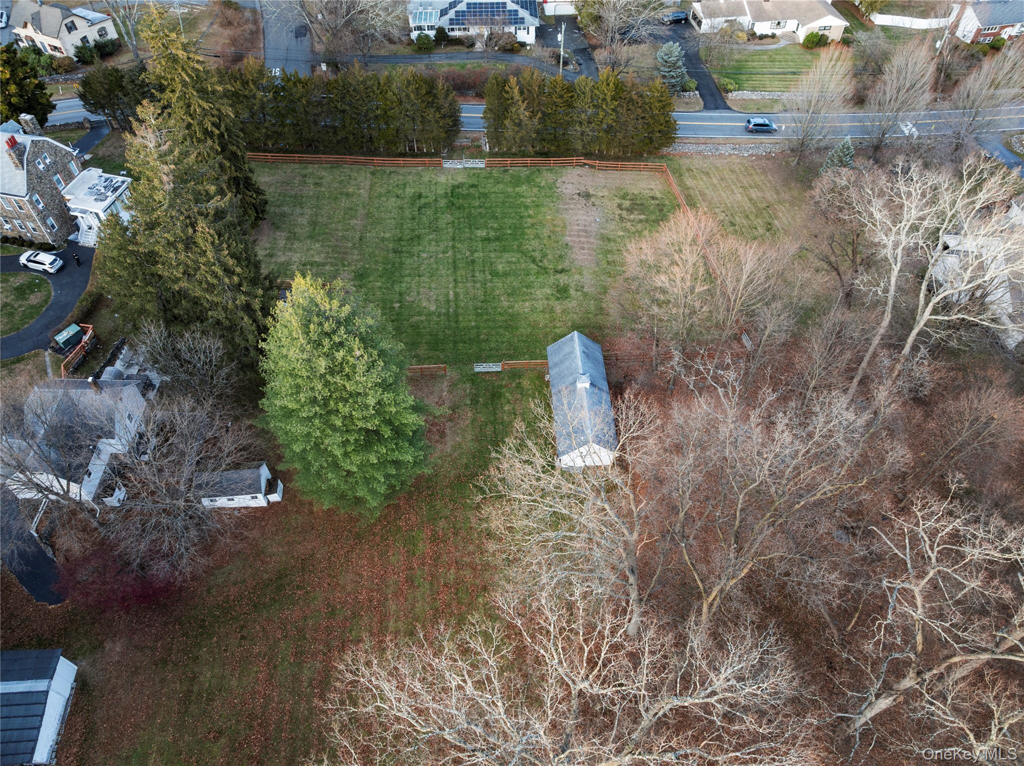 60 Montebello Road Montebello, NY 10901 - Photo 3 of 8 a view of a tree with a yard