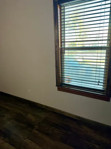 a view of a window in an empty room