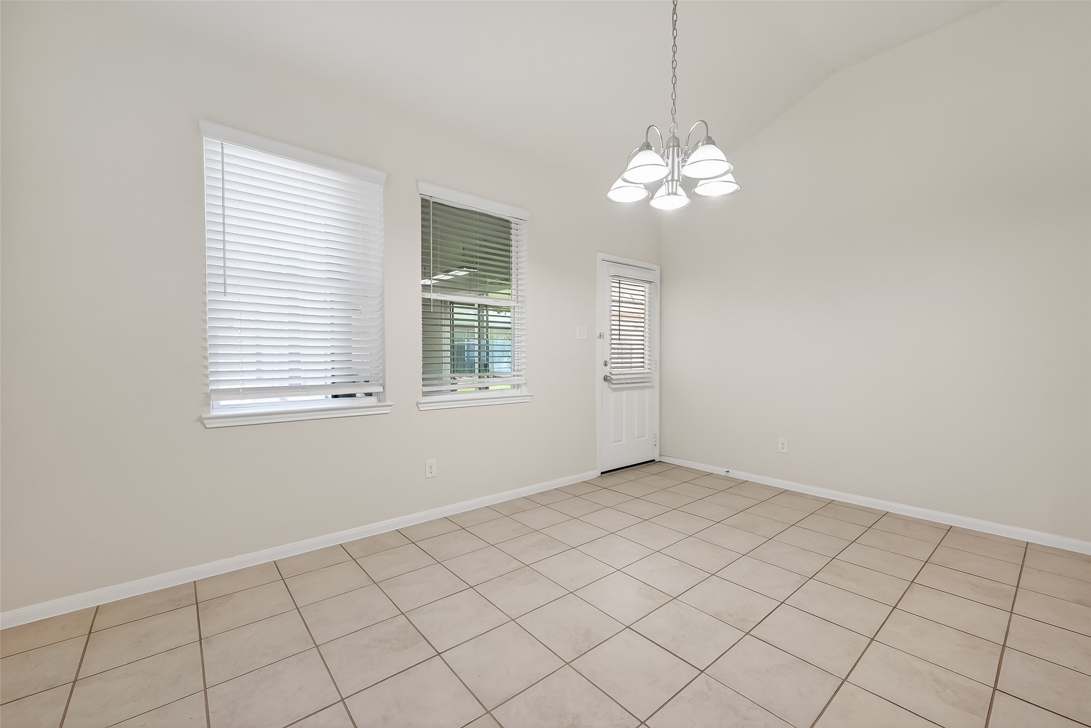 7631 Granite Terrace Lane Houston, TX 77083 - Photo 10 of 46 a view of an empty room with a window