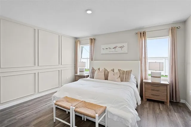 a bedroom with a bed and a closet