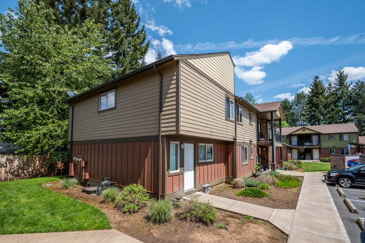 39501 Evans Street Sandy, OR 97055 - Photo 6 of 15 a front view of a house with garden