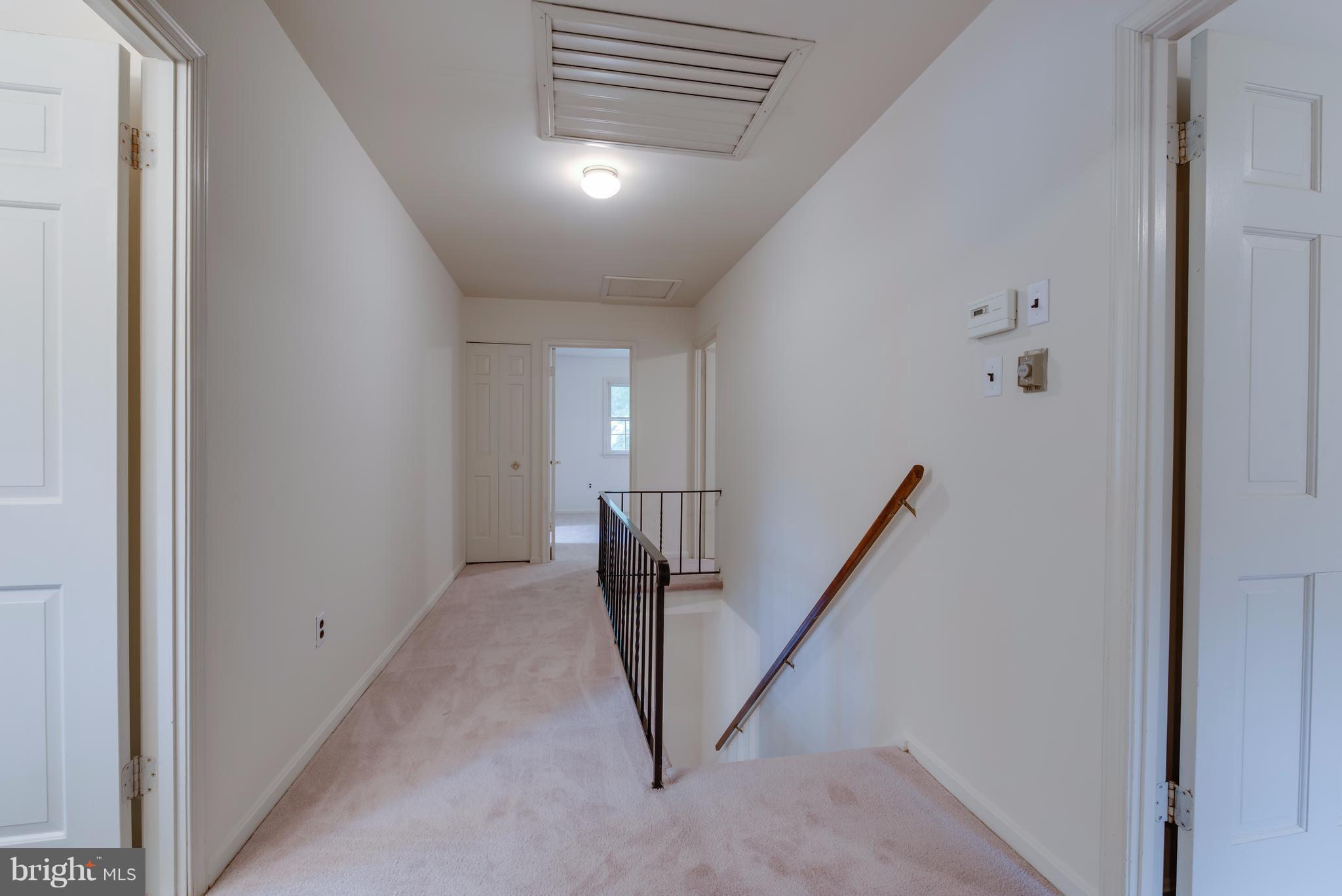 314 Ayito Road Southeast Vienna, VA 22180 - Photo 11 of 12 a view of a hallway with staircase