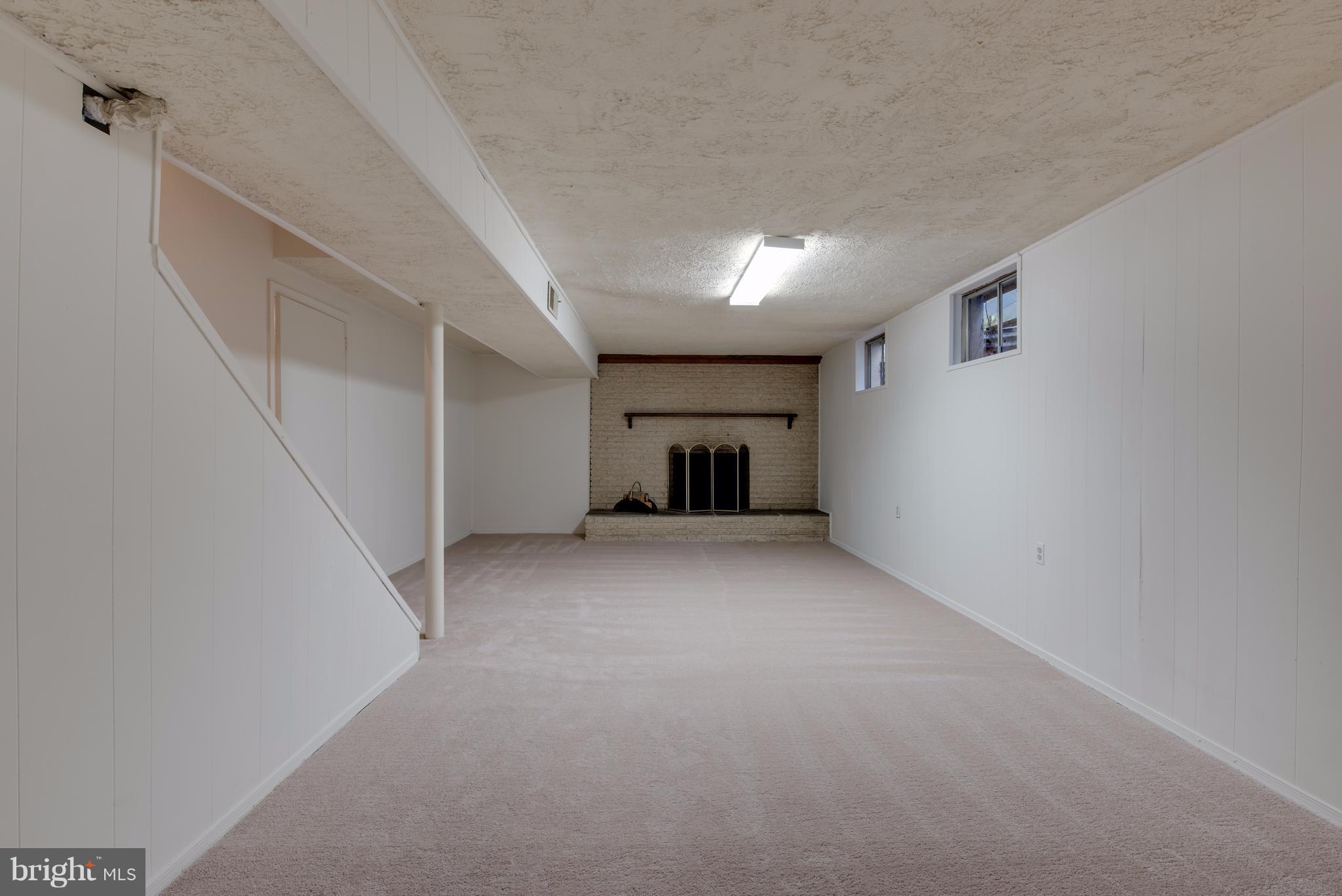 314 Ayito Road Southeast Vienna, VA 22180 - Photo 3 of 12 a view of empty room with fireplace