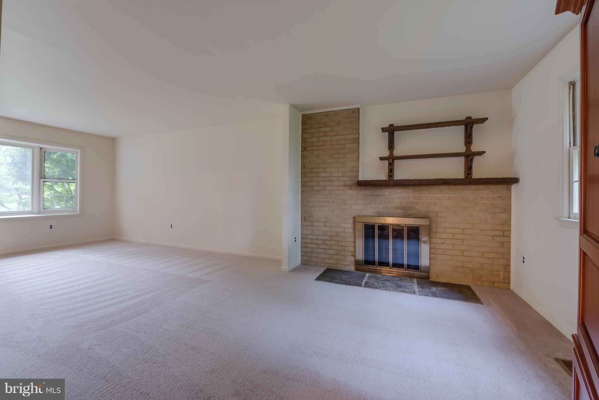 314 Ayito Road Southeast Vienna, VA 22180 - Photo 8 of 12 a view of a livingroom with a fireplace