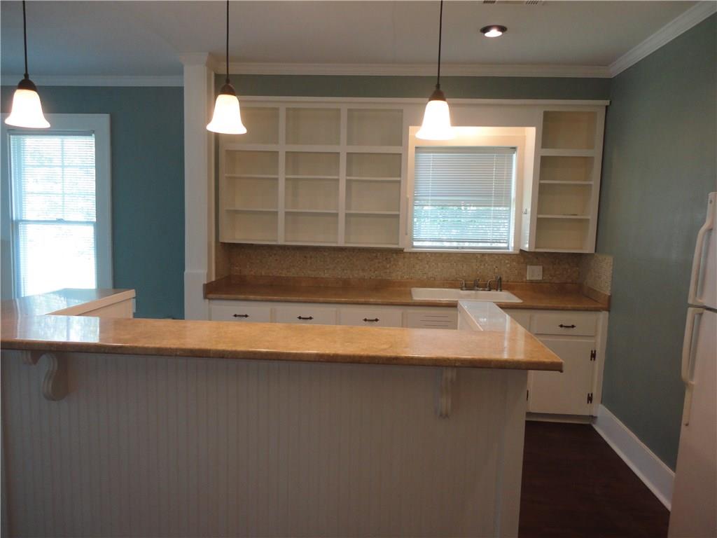 200 East 33rd Street Austin, TX 78705 - Photo 12 of 27 a view of kitchen with granite countertop sink