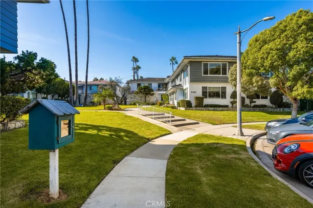 a view of a house with swimming pool yard and patio