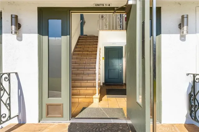 a view of a hallway with a living room