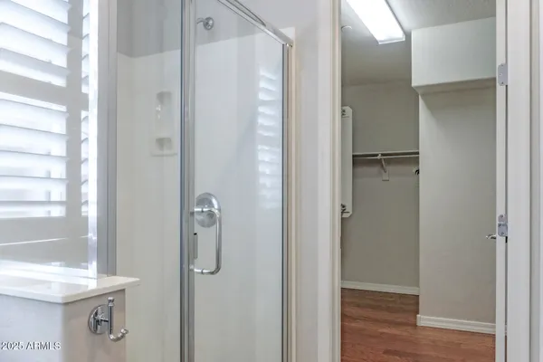 a bathroom with a sink double vanity and a mirror
