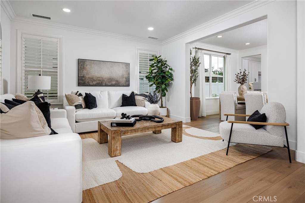 3 Tudor Way Ladera Ranch, CA 92694 - Photo 5 of 25 a living room with furniture and a flat screen tv