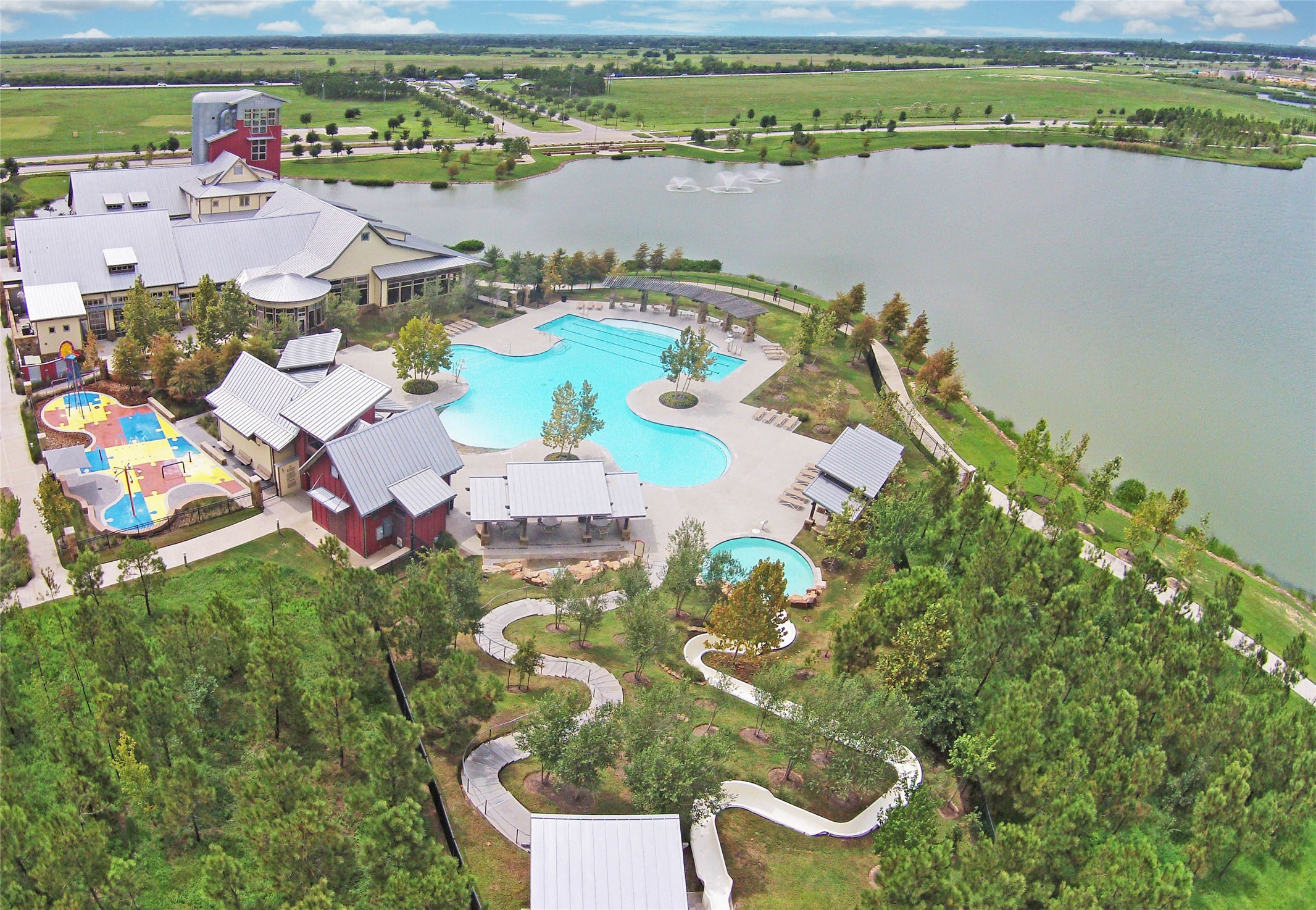 28211 Rippling Brook Lane Fulshear, TX 77441 - Photo 40 of 45 an aerial view of a house with a swimming pool